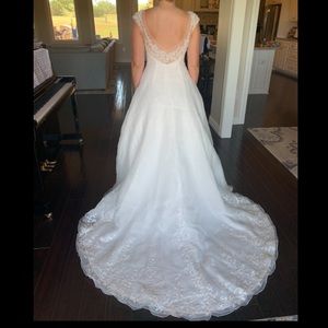 Wedding dress size 8 with bustle.